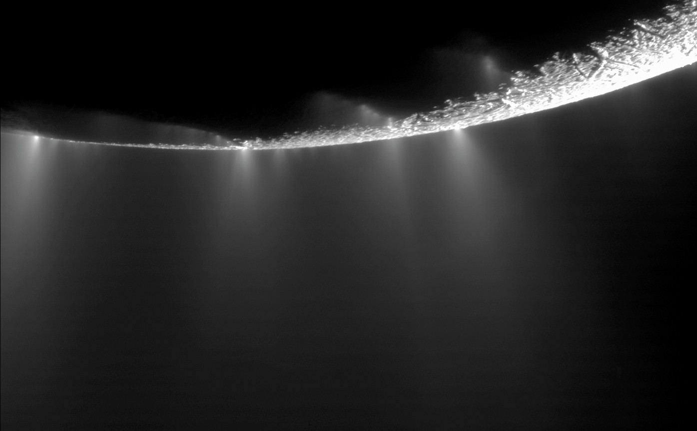 Cassini's backlit view of Enceladus firing water-ice jets from its hidden ocean